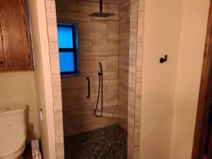 Complete bathroom remodeling pebble shower floor