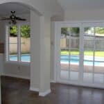 Added wall niche at pool house/french door offers easy access