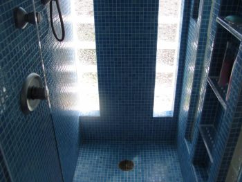 Blue mosaic tile shower remodeling